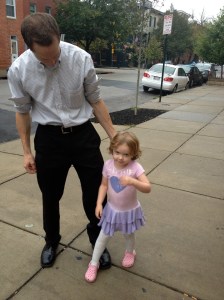 student and dad walk to school on International Walk to School Day