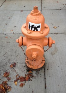 Random LOVE LOVE sticker spruces up a fire hydrant in Patterson Park