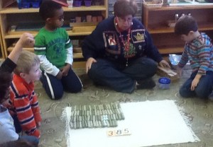 TNCS kindergartners have rolled and counted $385 worth of dimes to donate to Heifer International