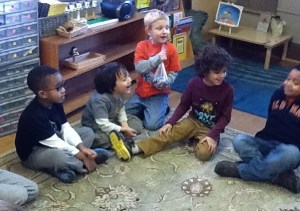 estimating number of dimes by weighing the sack to determine how much money TNCS primary students will donate to Heifer International 