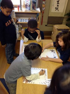 Graphing dimes kindergartners collaborate on a math project for donating dimes to Heifer International