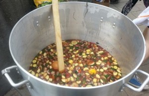 Eat-in protestors gently demonstrated their disapproval of GMOs by cooking soup with homegrown ingredients. No tear gas required!   