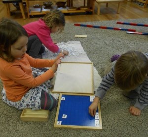 Hard at work with the hundreds board