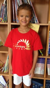 Wearing her TNCS shirt, Grace represents the school beautifully!