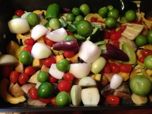 Potatoes, squash, and beets were pre-roasted, and now the whole shebang is about to go back in for final roasting.