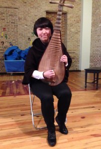Li Laoshi poses with her pipa just before the concert began.