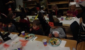 The Chinese immersion preprimary students (Native Americans) joined Mrs. Lawson's primary students (pilgrims) for the Thanksgiving meal.