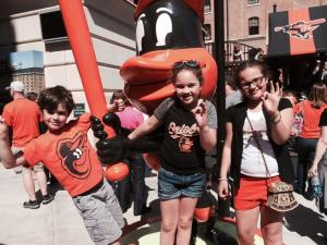 TNCS students pose with the Oriole Bird. Hey, why doesn't the O's mascot have a name, anyway?